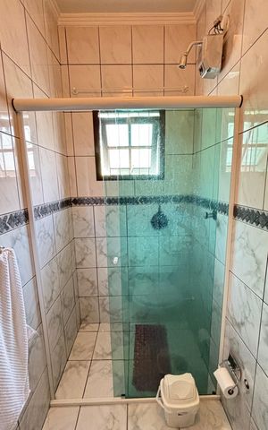 Casa à venda com 128m², 4 quartos e 4 vagas Casa à venda com 128m², 4 quartos e 4 vagasBanheiro da Suíte 3