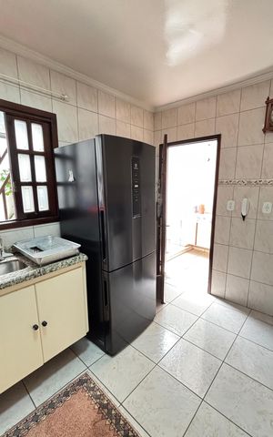 Casa à venda com 128m², 4 quartos e 4 vagas Casa à venda com 128m², 4 quartos e 4 vagasCozinha
