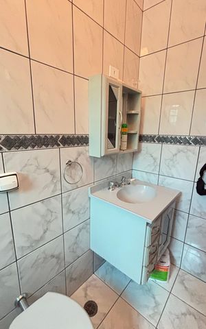 Casa à venda com 128m², 4 quartos e 4 vagas Casa à venda com 128m², 4 quartos e 4 vagasBanheiro da Suíte 3