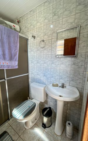 Casa à venda com 225m², 3 quartos e 5 vagas Casa à venda com 225m², 3 quartos e 5 vagasBanheiro do Quarto 1