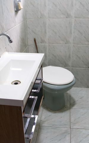 Casa à venda com 256m², 4 quartos e 4 vagas Casa à venda com 256m², 4 quartos e 4 vagasLavabo
