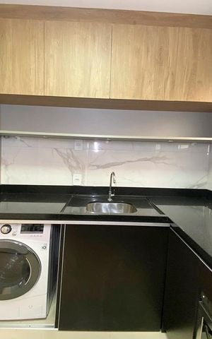 Apartamento à venda com 58m², 2 quartos e 1 vagaCozinha e Área de Serviço