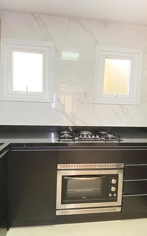 Apartamento à venda com 58m², 2 quartos e 1 vagaCozinha e Área de Serviço