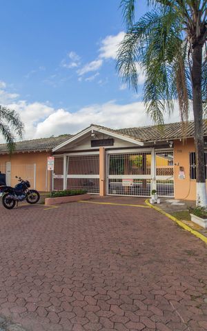 Casa de condomínio à venda com 60m², 2 quartos e 2 vagas Casa de condomínio à venda com 60m², 2 quartos e 2 vagasFachada