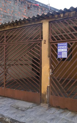Casa à venda com 150m², 1 quarto e 2 vagasFachada do imóvel - Placa instalada no portão do imóvel