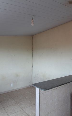 Casa à venda com 360m², 5 quartos e 2 vagasCasa dos Fundos | Sala e Cozinha