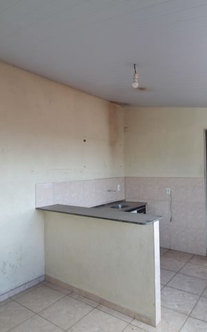 Casa à venda com 360m², 5 quartos e 2 vagasCasa dos Fundos | Sala e Cozinha