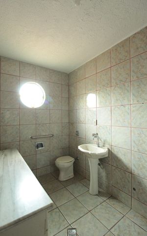 Casa à venda com 360m², 5 quartos e 2 vagasBanheiro da Suite