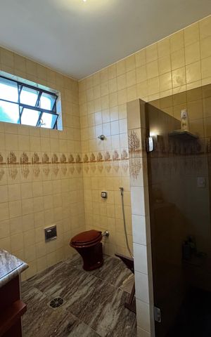 Casa à venda com 400m², 8 quartos e 5 vagas Casa à venda com 400m², 8 quartos e 5 vagasBanheiro da Suíte 2