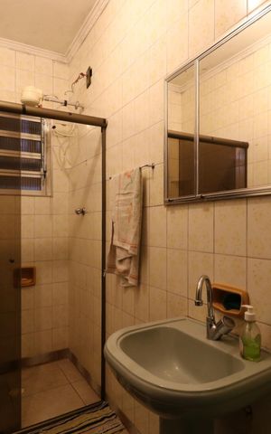 Casa à venda com 384m², 4 quartos e 2 vagasBanheiro 2