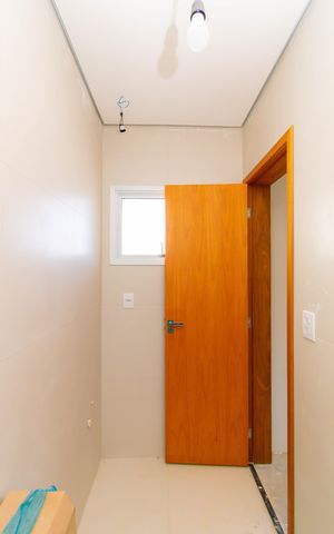 Casa de condomínio à venda com 76m², 2 quartos e 1 vaga Casa de condomínio à venda com 76m², 2 quartos e 1 vagaBanheiro da Suíte 2