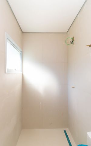 Casa de condomínio à venda com 76m², 2 quartos e 1 vaga Casa de condomínio à venda com 76m², 2 quartos e 1 vagaBanheiro da Suíte 1