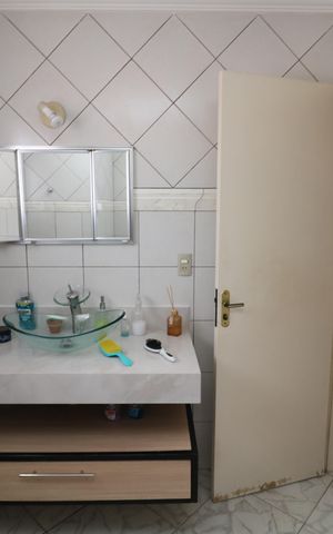Casa à venda com 240m², 5 quartos e 4 vagasBanheiro Casa 2