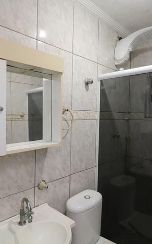 Casa à venda com 240m², 5 quartos e 4 vagasBanheiro da Suíte
