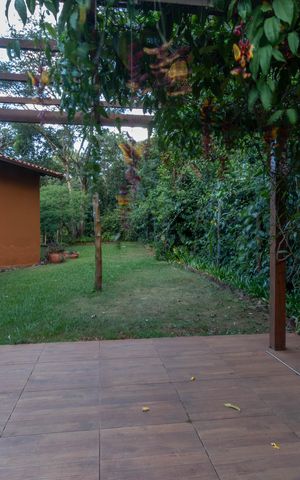 Casa de condomínio à venda com 595m², 4 quartos e 6 vagas Casa de condomínio à venda com 595m², 4 quartos e 6 vagasÁrea externa