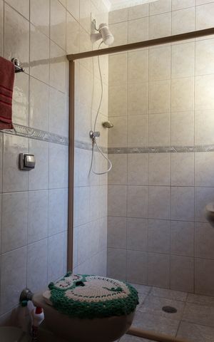 Casa à venda com 177m², 3 quartos e 1 vaga Casa à venda com 177m², 3 quartos e 1 vagaBanheiro da Suíte 1