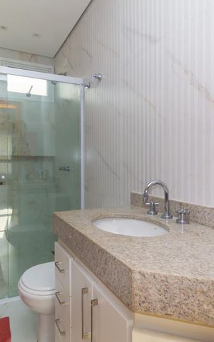 Casa à venda com 260m², 3 quartos e 3 vagasBanheiro da Suíte 1