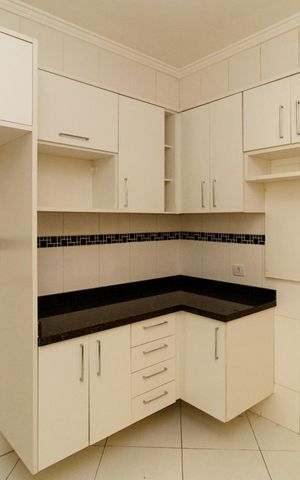 Casa de condomínio à venda com 100m², 3 quartos e 2 vagas Casa de condomínio à venda com 100m², 3 quartos e 2 vagasCozinha