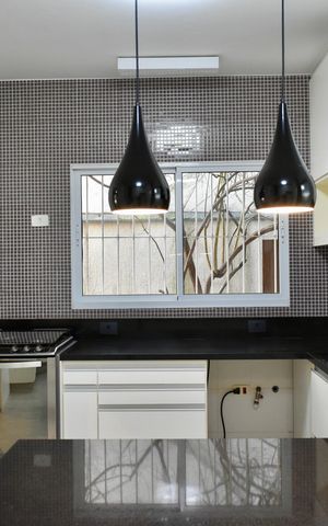 Casa à venda com 190m², 3 quartos e 3 vagas Casa à venda com 190m², 3 quartos e 3 vagasCozinha