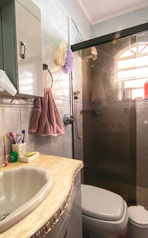 Casa à venda com 180m², 4 quartos e 2 vagas Casa à venda com 180m², 4 quartos e 2 vagasBanheiro da Suíte 2