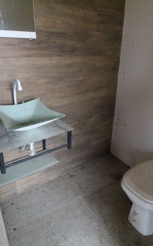 Casa de condomínio à venda com 201m², 5 quartos e 1 vagaBanheiro da churrasqueira 