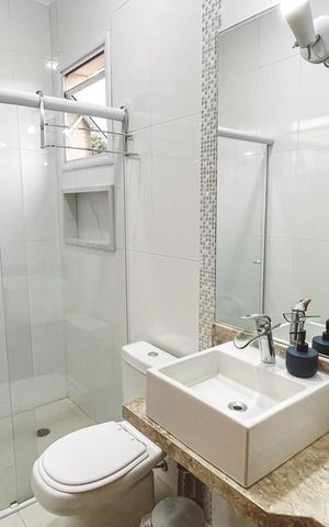 Casa de condomínio à venda com 200m², 3 quartos e 4 vagas Casa de condomínio à venda com 200m², 3 quartos e 4 vagasBanheiro da Suíte