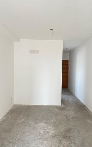 Apartamento à venda com 64m², 2 quartos e 2 vagasSala