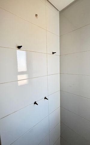 Apartamento à venda com 64m², 2 quartos e 2 vagas Apartamento à venda com 64m², 2 quartos e 2 vagasBanheiro da Suíte