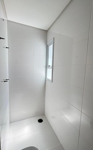 Apartamento à venda com 64m², 2 quartos e 2 vagas Apartamento à venda com 64m², 2 quartos e 2 vagasBanheiro da Suíte