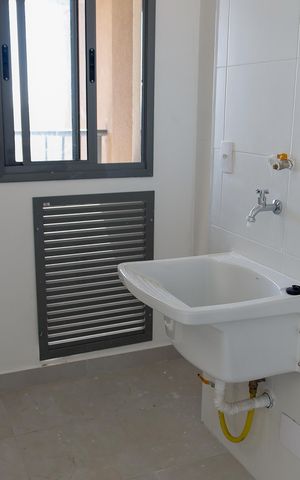 Apartamento à venda com 64m², 2 quartos e 2 vagas Apartamento à venda com 64m², 2 quartos e 2 vagasLavanderia