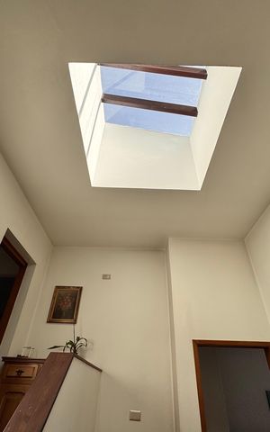 Casa à venda com 230m², 4 quartos e 3 vagasCorredor acesso aos quartos e suíte