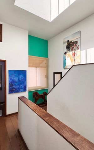 Casa à venda com 230m², 4 quartos e 3 vagasCorredor acesso aos quartos e suíte