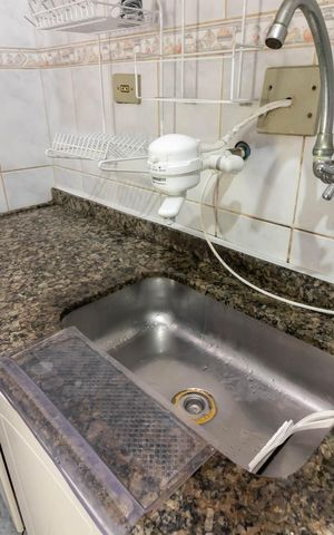 Casa à venda com 255m², 4 quartos e 2 vagas Casa à venda com 255m², 4 quartos e 2 vagasCozinha
