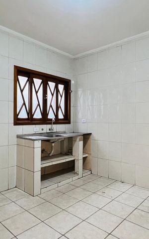 Casa à venda com 94m², 2 quartos e 3 vagas Casa à venda com 94m², 2 quartos e 3 vagasCozinha