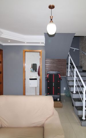 Casa à venda com 129m², 2 quartos e 2 vagasSala