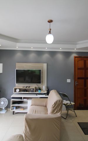 Casa à venda com 129m², 2 quartos e 2 vagasSala