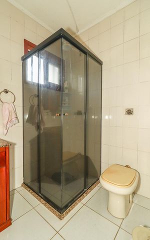 Casa à venda com 271m², 3 quartos e 2 vagasBanheiro 2