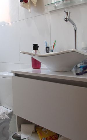Casa à venda com 130m², 4 quartos e 4 vagasBanheiro Social Casa 2 Fundos
