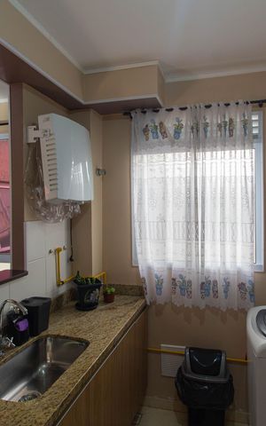 Apartamento à venda com 45m², 2 quartos e 1 vaga Apartamento à venda com 45m², 2 quartos e 1 vagaCozinha e Área de Serviço