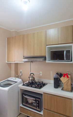 Apartamento à venda com 45m², 2 quartos e 1 vaga Apartamento à venda com 45m², 2 quartos e 1 vagaCozinha e Área de Serviço
