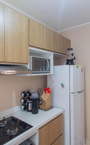Apartamento à venda com 45m², 2 quartos e 1 vaga Apartamento à venda com 45m², 2 quartos e 1 vagaCozinha e Área de Serviço