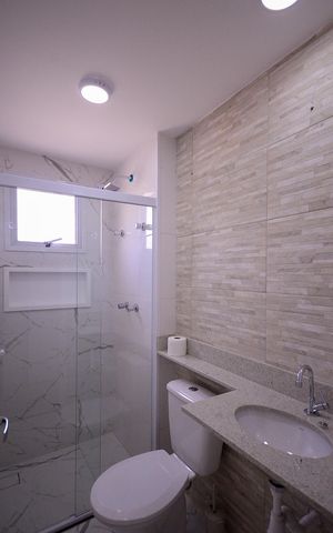 Apartamento à venda com 57m², 2 quartos e 2 vagas Apartamento à venda com 57m², 2 quartos e 2 vagasBanheiro da Suíte