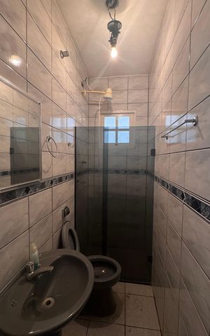 Casa à venda com 220m², 4 quartos e 3 vagasBanheiro 