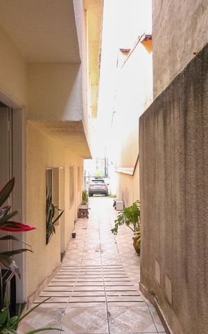 Casa de condomínio à venda com 110m², 2 quartos e 1 vagaQuintal