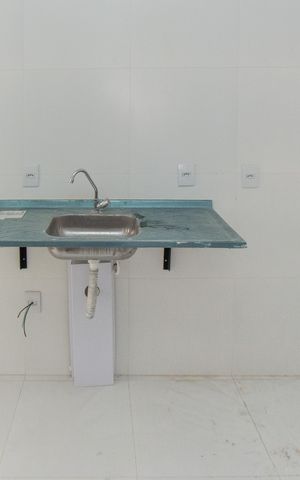Apartamento à venda com 44m², 2 quartos e 1 vaga Apartamento à venda com 44m², 2 quartos e 1 vagaCozinha e Área de Serviço