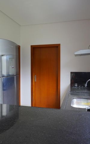 Casa de condomínio para alugar com 200m², 4 quartos e 4 vagasCozinha