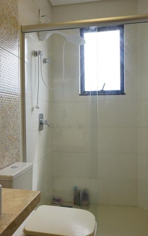 Casa de condomínio para alugar com 200m², 4 quartos e 4 vagasBanheiro corredor