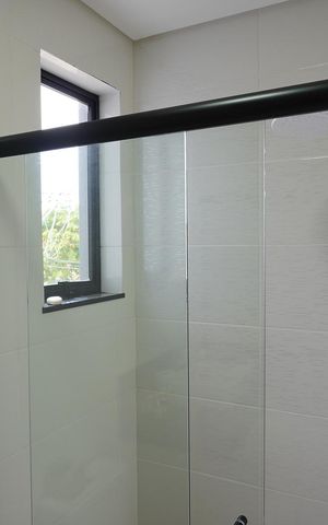 Casa de condomínio para alugar com 200m², 4 quartos e 4 vagasBanheiro da Suíte