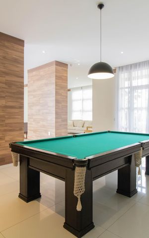 Apartamento à venda com 106m², 3 quartos e 2 vagas Apartamento à venda com 106m², 3 quartos e 2 vagasÁrea Comum - Salão de Jogos