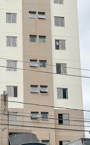 Apartamento à venda com 59m², 2 quartos e 1 vagaFachada + plaquinha